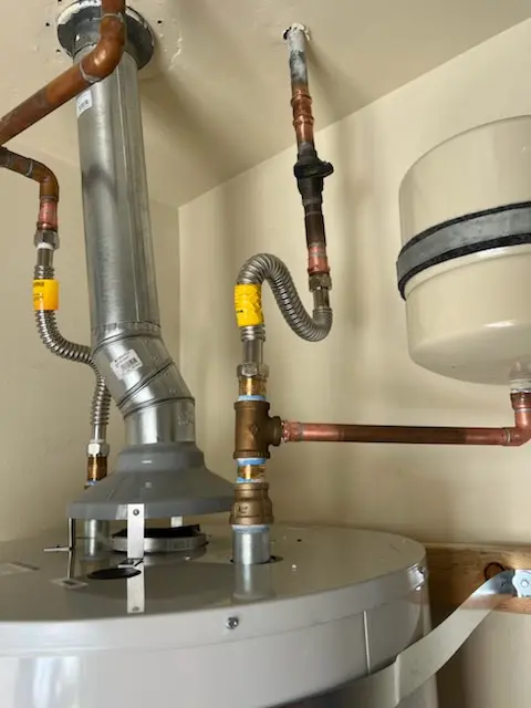 Water heater installation and plumbing repair in Small Corners